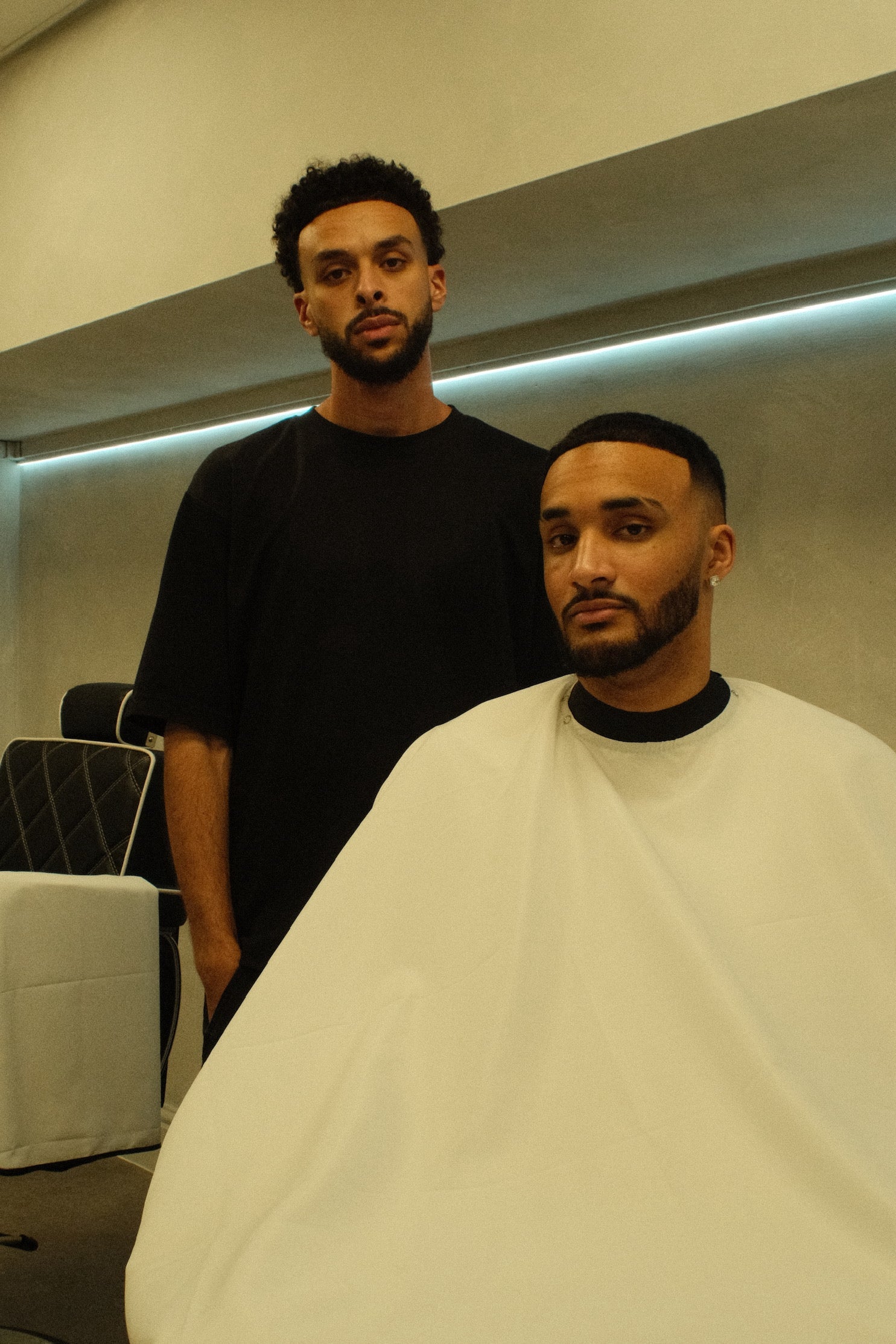 Two men in a barbershop